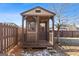 Wooden storage shed with a porch at 704 Kitts Ct, Mcdonough, GA 30253