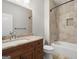 Bathroom with tile shower, bathtub, and vanity with granite countertop at 3213 Woodlynne Way, Atlanta, GA 30340