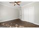 Bedroom with hardwood floors, ceiling fan and double door closet at 3213 Woodlynne Way, Atlanta, GA 30340