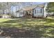 One-story craftsman home with a covered porch and attached garage at 3213 Woodlynne Way, Atlanta, GA 30340