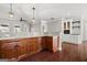 Modern kitchen with wood cabinets, granite countertops and stainless steel appliances at 3213 Woodlynne Way, Atlanta, GA 30340