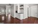 White built-in coffee bar with dark countertop and open shelving at 3213 Woodlynne Way, Atlanta, GA 30340