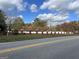 Brick columns line the entrance to this property, offering curb appeal at 3970 Ewing Rd, Austell, GA 30106