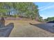 Large backyard with wooden privacy fence at 123 Courtneys Ln, Fayetteville, GA 30215