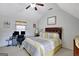 Bedroom with a king-size bed and built-in workspace at 123 Courtneys Ln, Fayetteville, GA 30215