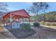 Lakeside gazebo with picnic tables at 123 Courtneys Ln, Fayetteville, GA 30215