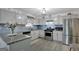 Modern kitchen with stainless steel appliances and granite countertops at 123 Courtneys Ln, Fayetteville, GA 30215