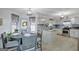 Modern kitchen with stainless steel appliances and blue tile backsplash at 123 Courtneys Ln, Fayetteville, GA 30215