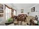 Living room with a leather sofa and wooden coffee table at 123 Courtneys Ln, Fayetteville, GA 30215