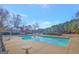 Community swimming pool with lakeside views at 123 Courtneys Ln, Fayetteville, GA 30215