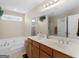 Double vanity bathroom with soaking tub and separate shower at 1598 Thornwick Trce, Stockbridge, GA 30281