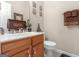 Clean bathroom with wood vanity and modern fixtures at 1598 Thornwick Trce, Stockbridge, GA 30281