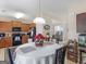 Dining area with round table and chairs near kitchen at 1598 Thornwick Trce, Stockbridge, GA 30281