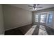 Bright bedroom with bay windows and ceiling fan at 122 Oak S Cir, Stockbridge, GA 30281