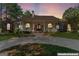 Charming home with a circular driveway and welcoming front porch perfect for relaxing and entertaining at 3806 Bill Gardner Pkwy, Locust Grove, GA 30248