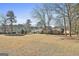 House nestled in a large backyard setting at 2984 Walt Stephens Rd, Jonesboro, GA 30236