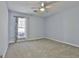 Bright bedroom with ceiling fan and neutral wall color at 2984 Walt Stephens Rd, Jonesboro, GA 30236