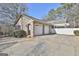 Two-car brick garage with white doors at 2984 Walt Stephens Rd, Jonesboro, GA 30236