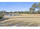 Landscaped golf course with pond and trees in background at 2984 Walt Stephens Rd, Jonesboro, GA 30236