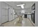 Kitchen with gray cabinets, granite countertops, and island at 2984 Walt Stephens Rd, Jonesboro, GA 30236