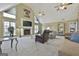 Vaulted ceiling living room with fireplace and lots of natural light at 2984 Walt Stephens Rd, Jonesboro, GA 30236