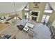 High ceiling living room with fireplace and two ceiling fans at 2984 Walt Stephens Rd, Jonesboro, GA 30236