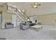 Two-story living room with built-in shelving and fireplace at 2984 Walt Stephens Rd, Jonesboro, GA 30236