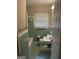 Bathroom with green tile and classic fixtures at 1310 Celia Way, Decatur, GA 30032