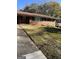 Ranch house with a driveway and a well-maintained lawn at 1310 Celia Way, Decatur, GA 30032