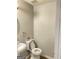 Clean bathroom featuring a toilet, sink, and shower at 1762 Wood Stork Dr, Hampton, GA 30228