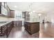 Spacious kitchen with dark cabinets and granite countertops at 189 Aylesbury Blvd, Mcdonough, GA 30252