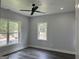 Bright bedroom with large windows and hardwood floors at 935 Pelham Nw St, Atlanta, GA 30318