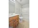 Bathroom with tub, shower, and wood vanity at 5260 Shirewick Dr, Lithonia, GA 30058