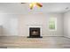 Living room featuring a fireplace and neutral decor at 5260 Shirewick Dr, Lithonia, GA 30058