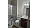 Clean bathroom with shower, toilet and vanity at 7019 Blue Sky Dr, Locust Grove, GA 30248