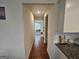 Hallway connecting kitchen to dining room at 7019 Blue Sky Dr, Locust Grove, GA 30248