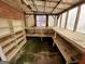 Spacious workshop with built-in shelving and workbenches at 213 Whippoorwill Way, Riverdale, GA 30274