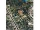 Aerial view showing home's location and surrounding area at 60 N East Main St, Hampton, GA 30228