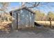 Old storage shed in the backyard at 60 N East Main St, Hampton, GA 30228