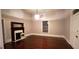 Bright living room with hardwood floors and fireplace at 192 Cloud St, Jonesboro, GA 30236