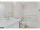 Bathroom with white bathtub and marble vanity at 217 Crystal Ct, Hampton, GA 30228