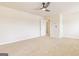 Large bedroom with ceiling fan and door to bathroom at 760 Great Oak Pl # 22, Villa Rica, GA 30180