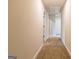 Simple hallway with neutral walls and carpeted floors at 760 Great Oak Pl # 22, Villa Rica, GA 30180