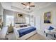 Serene primary bedroom with tray ceiling, plush bedding, and stylish decor at 1467 Trellis Court (Lot 5), Hampton, GA 30228