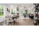 Bright dining area with neutral paint, modern furnishings, and large windows overlooking the backyard at 1479 Trellis Court (Lot 3), Hampton, GA 30228