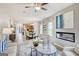 Bright and open living space with a fireplace, modern furnishings, and ample natural light at 1479 Trellis Court (Lot 3), Hampton, GA 30228