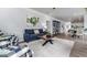 Inviting living room flows into the dining area with a cohesive design and ample space for entertaining at 1479 Trellis Court (Lot 3), Hampton, GA 30228