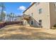 This home offers a spacious, gently sloping backyard, a wooden deck, and a classic vinyl siding at 5626 Wyncreek Sw Cir, South Fulton, GA 30331