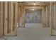 Spacious unfinished basement with exposed beams, concrete flooring, and wood framing at 5626 Wyncreek Sw Cir, South Fulton, GA 30331