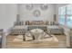 L-shaped sectional sofa, coffee table, and decorative pillows at 5626 Wyncreek Sw Cir, South Fulton, GA 30331